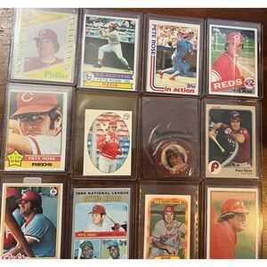 Vintage Lot of 11 Pete Rose Baseball cards and one collectible coin.